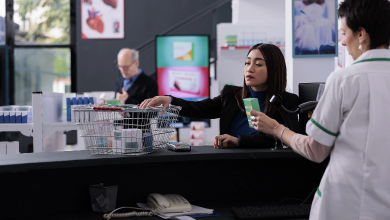 pharmacy-buyer-giving-cashier-medications-for-scan-utc