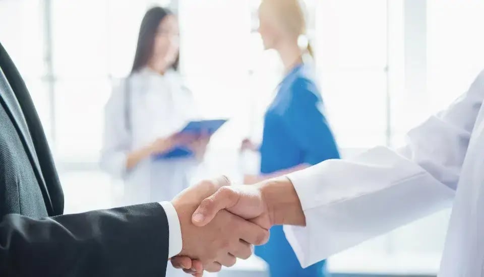 doctors-and-businessman-2024-10-18-09-18-22-utc